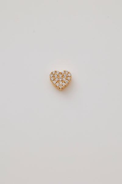 Gold heart-shaped pendant encrusted with sparkling diamonds arranged in a uniform pattern, covering the entire surface. The pendant exudes a luxurious and radiant appearance, set against a plain white background.