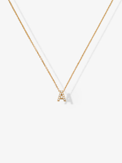  A delicate 18k solid gold necklace featuring two small, capital letter charms encrusted with diamonds. This stunning Two Letters Necklace in Diamonds and 18k Gold is displayed against a plain white background.