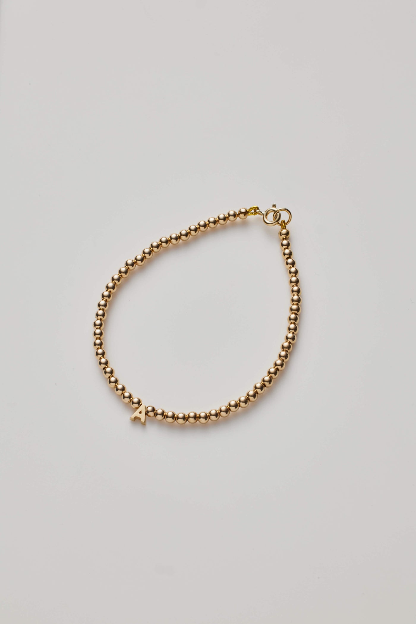 One Letter Gold Beaded Bracelet