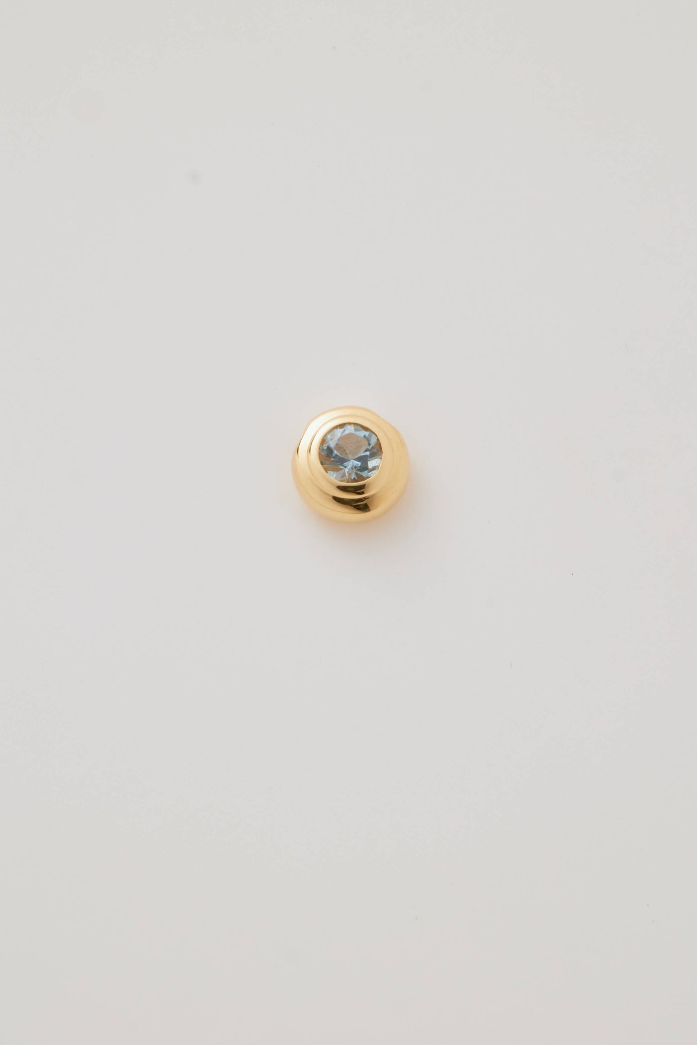 Solid gold birthstone charms featuring genuine gemstones for March – Aquamarine (Serenity & Courage) designed to slide onto a necklace chain for a personalised and meaningful jewellery piece.
