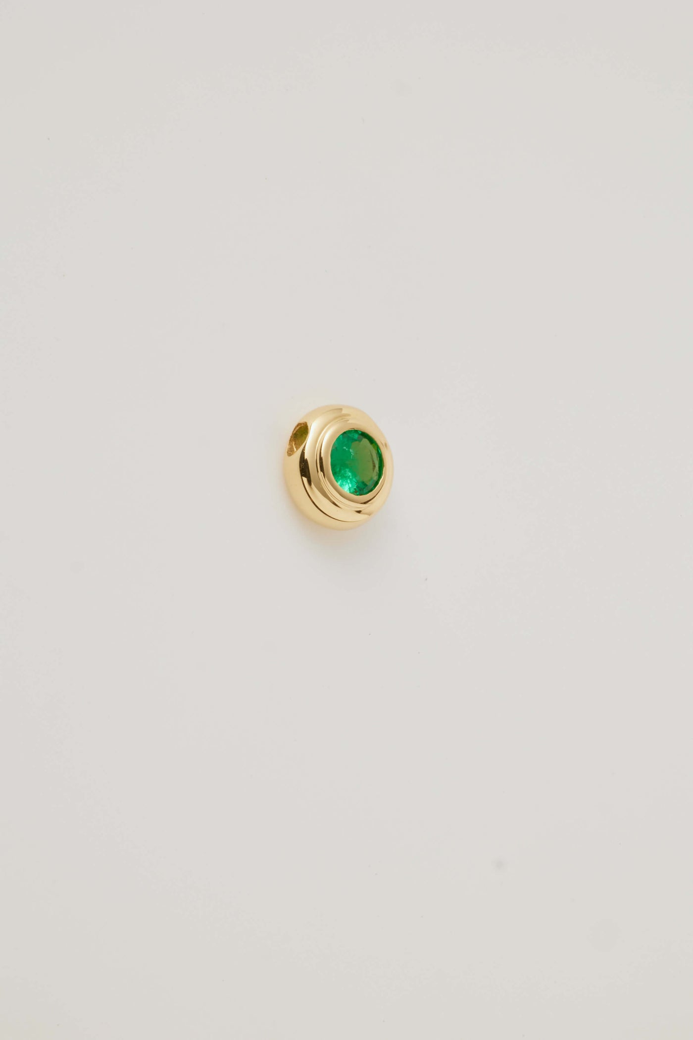 Solid gold birthstone charm for May – Emerald (Growth & Prosperity) featuring genuine gemstones for each month, designed to slide onto a necklace chain for a personalised and meaningful jewellery piece.