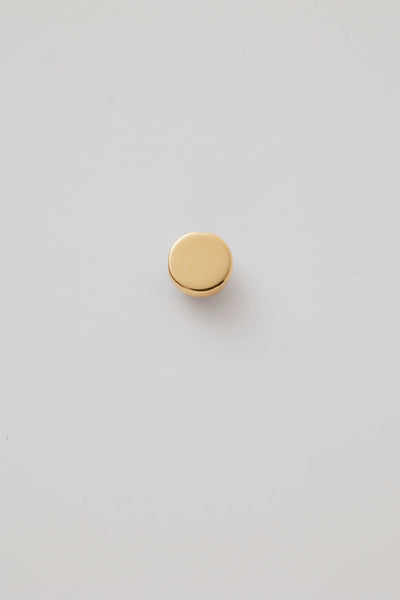 Small solid gold evil eye charm, designed to slide onto a necklace chain for a personalised jewellery piece.