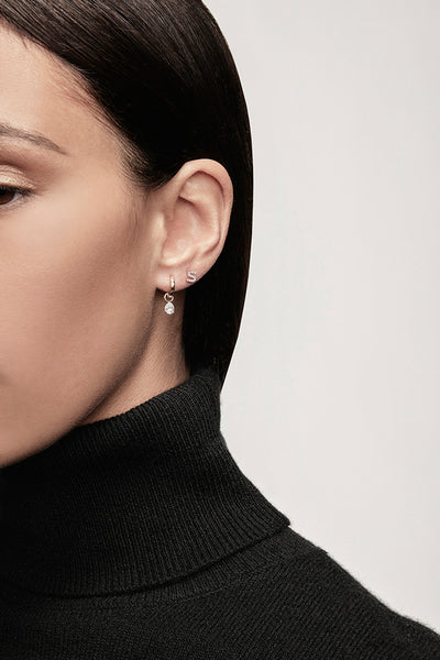 One White Sapphire Letter Stud